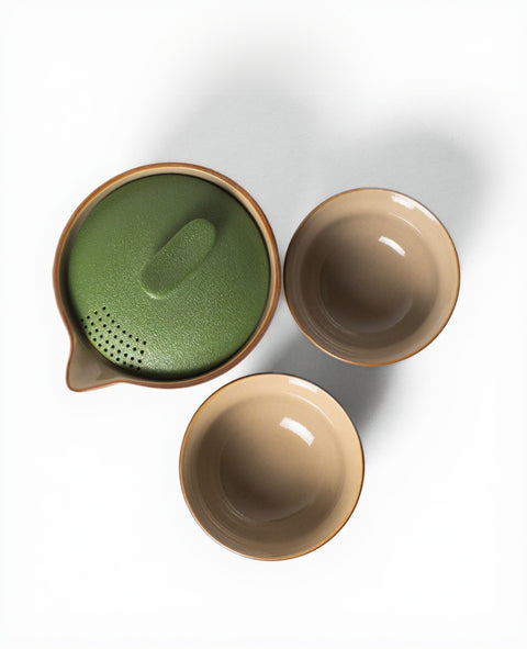 Three ceramic bowls with different shapes and colors on a white background